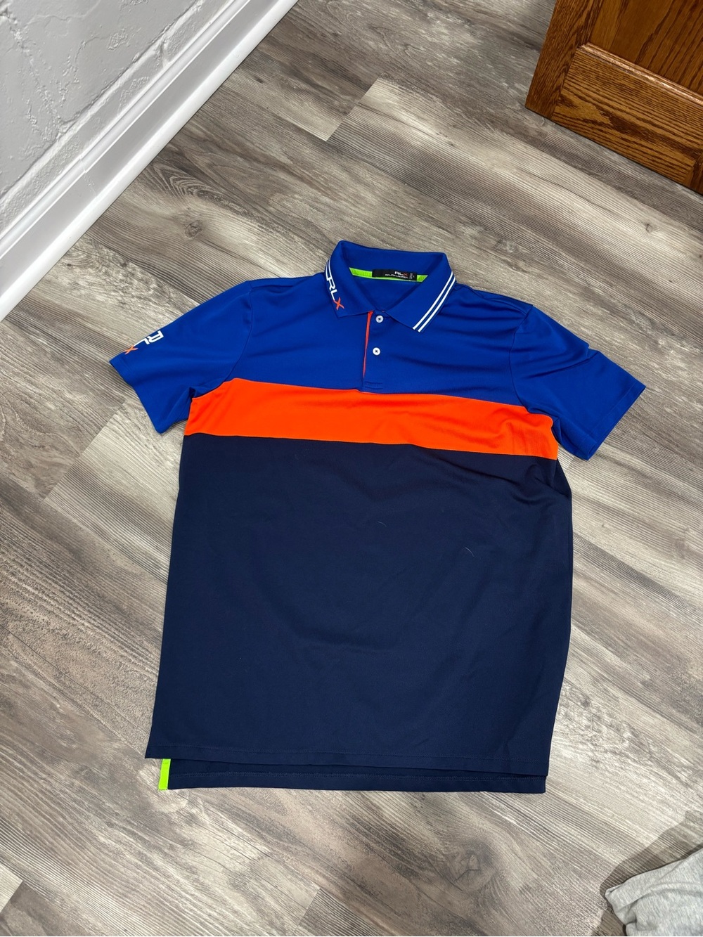 RLX Ralph Lauren Blue Golf Polo with Orange Chest Stripe